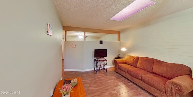 living room featuring a textured ceiling