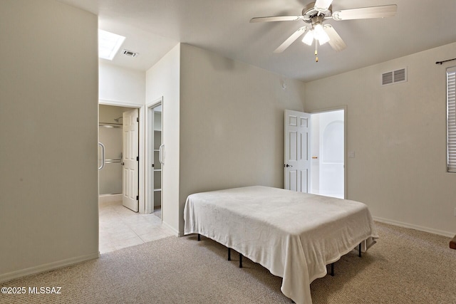 bedroom featuring ceiling fan and light colored carpet