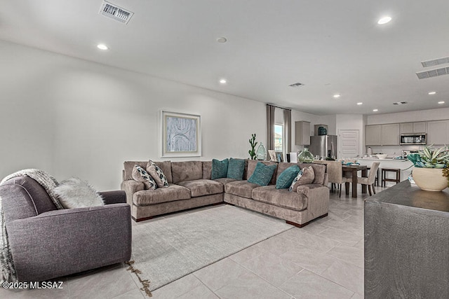 living room featuring light tile patterned floors