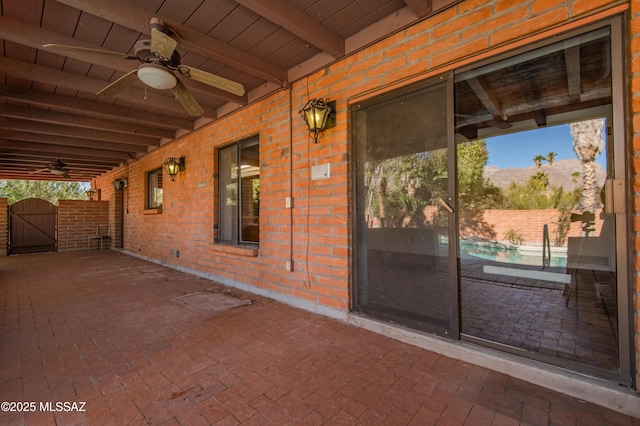 view of patio with ceiling fan