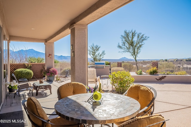 view of patio featuring a mountain view