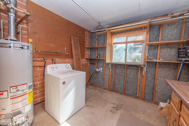 basement with washer / clothes dryer and water heater