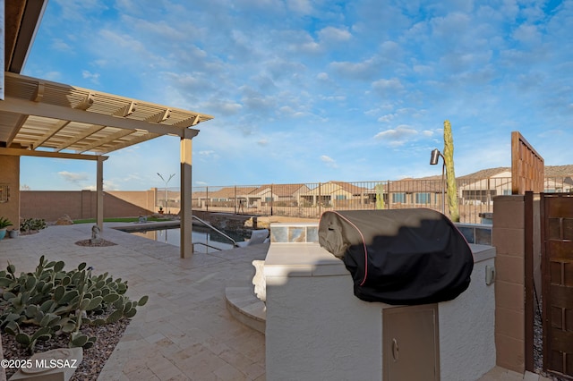 view of patio / terrace featuring a swimming pool and a pergola