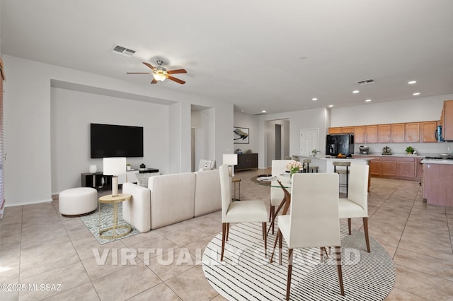 7826 W Sage Creek Ct, Tucson, AZ 85743 - dining space featuring light tile patterned floors, recessed lighting, and a ceiling fan