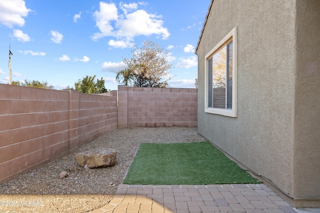 7826 W Sage Creek Ct, Tucson, AZ 85743 - fenced backyard with a patio