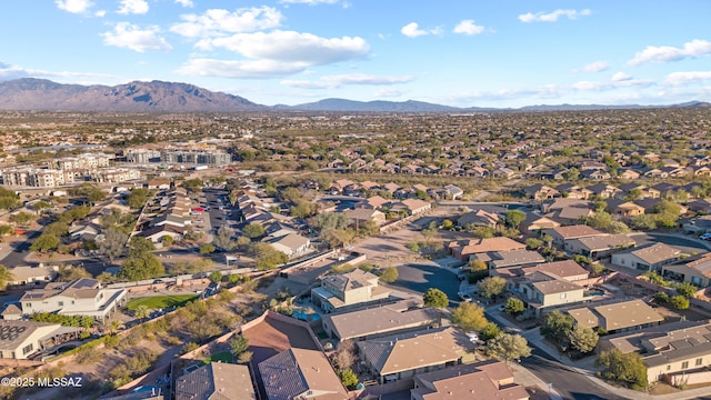 birds eye view of property featuring a mountain view