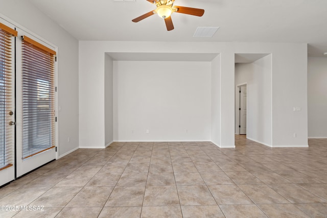 7826 W Sage Creek Ct, Tucson, AZ 85743 - spare room featuring ceiling fan, tile patterned floors, and baseboards