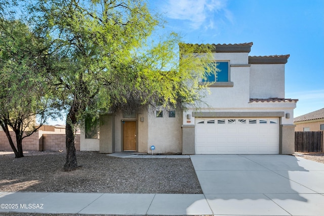 view of front of property featuring a garage