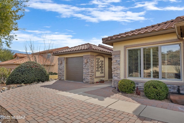 doorway to property featuring a garage