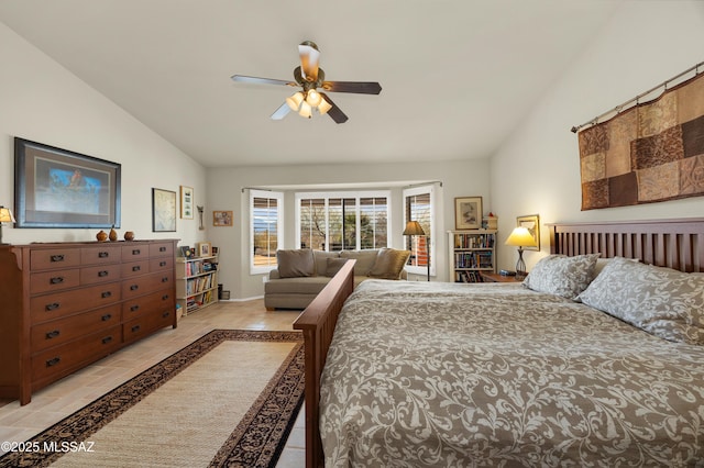 bedroom with lofted ceiling and ceiling fan