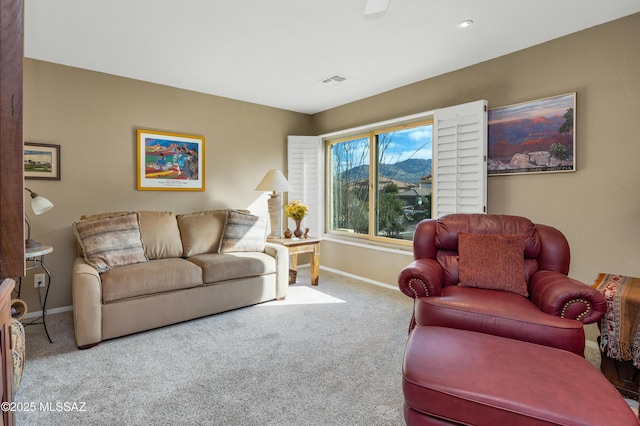 living room with light colored carpet