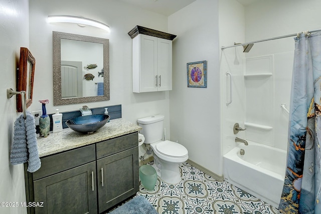 full bathroom with toilet, vanity, and shower / bath combo