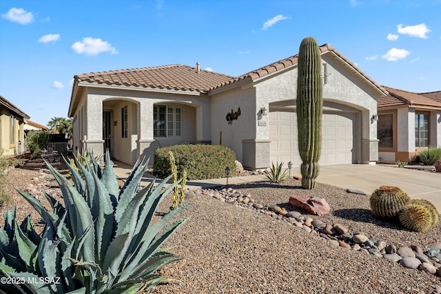 view of front of property with a garage