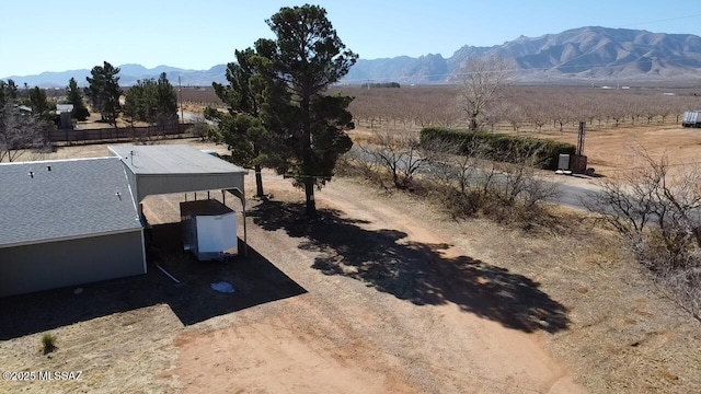 bird's eye view featuring a mountain view and a rural view