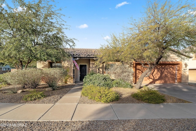 view of front of property featuring a garage