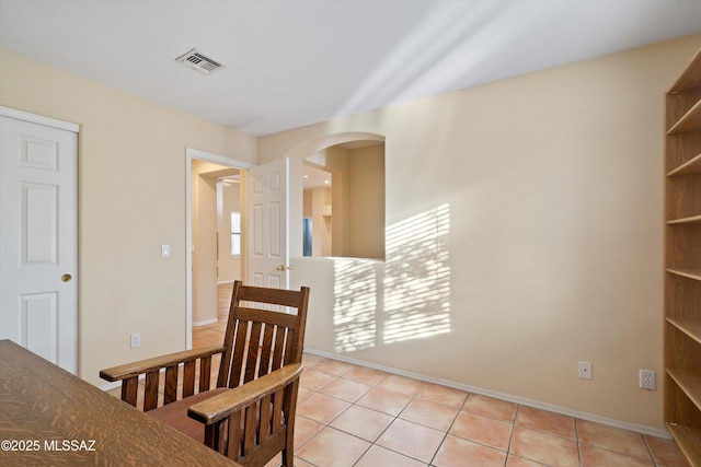 interior space with light tile patterned floors