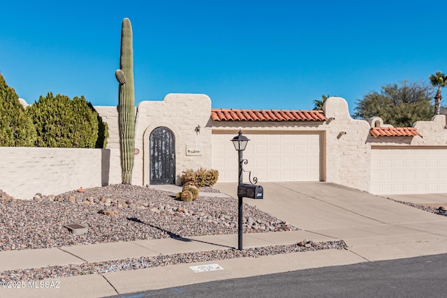 view of front of property with a garage