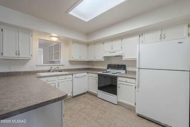 kitchen featuring sink, white appliances, white cabinetry, and light tile patterned flooring