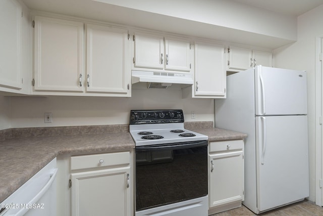 kitchen with white cabinetry and white appliances