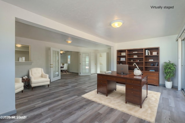 office area featuring french doors and hardwood / wood-style flooring