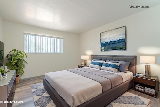 bedroom featuring light hardwood / wood-style flooring