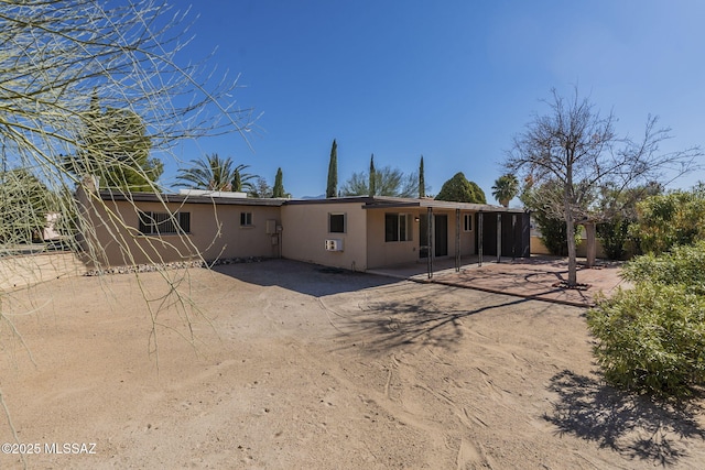 back of house featuring a patio area