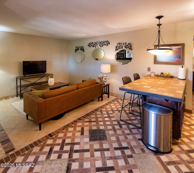 living room featuring tile patterned floors