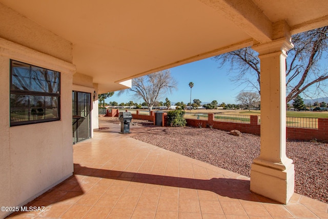 view of patio with a grill