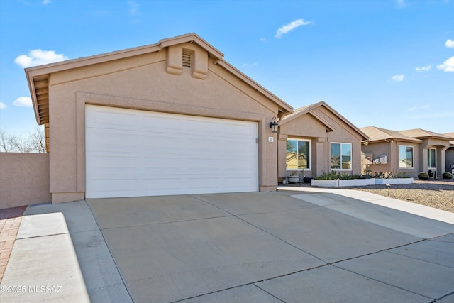 single story home with a garage