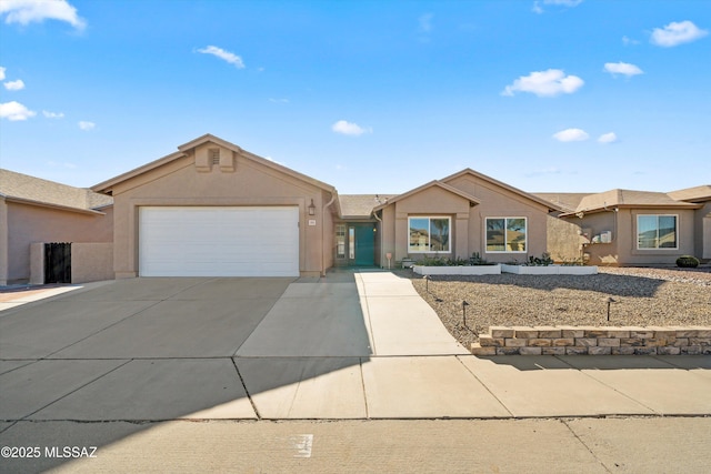 ranch-style home with a garage