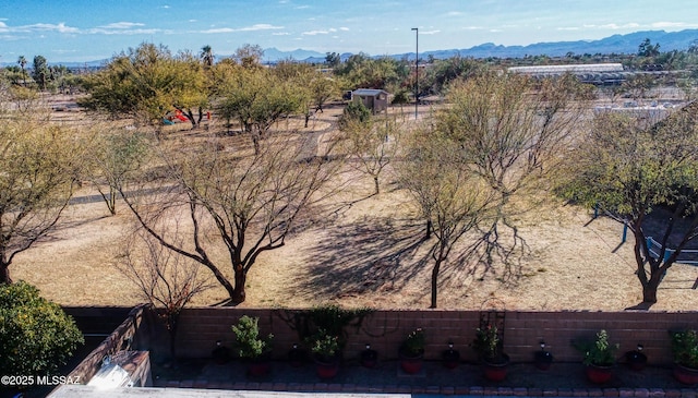 drone / aerial view featuring a mountain view