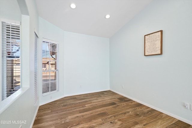 empty room featuring dark hardwood / wood-style floors