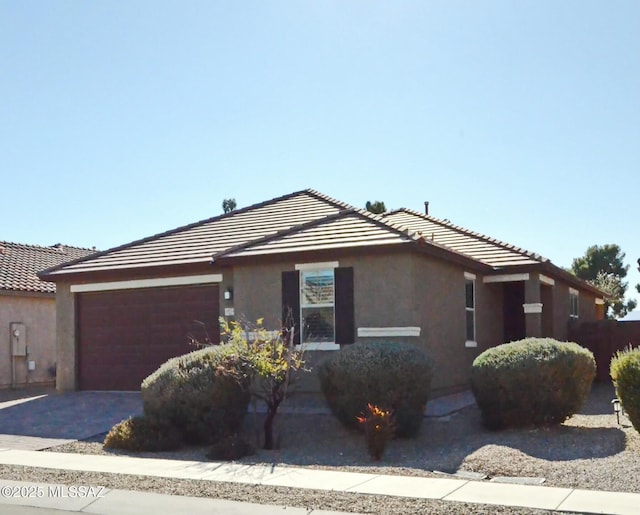 ranch-style house with a garage