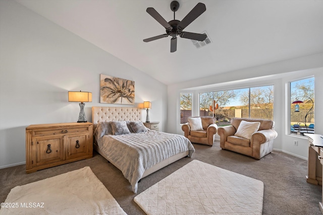 carpeted bedroom with ceiling fan and lofted ceiling