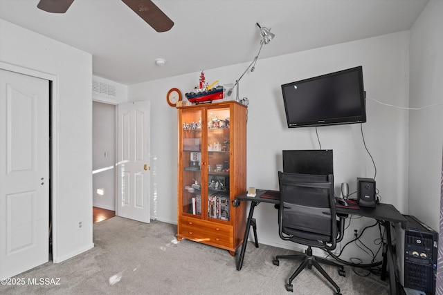 office space featuring carpet floors and ceiling fan