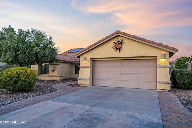 view of front of home featuring a garage