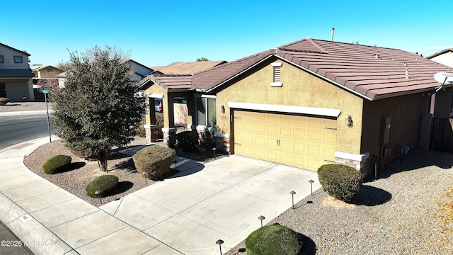 ranch-style house featuring a garage