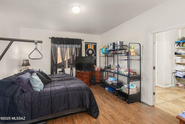 bedroom featuring wood-type flooring