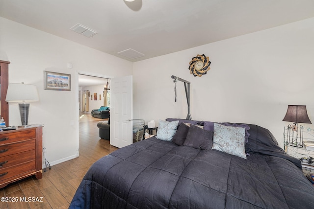 bedroom featuring hardwood / wood-style floors