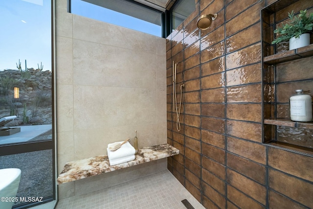 bathroom featuring a wealth of natural light