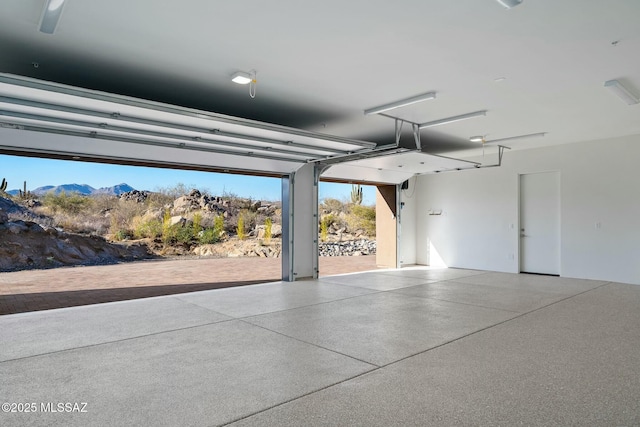 garage featuring a mountain view