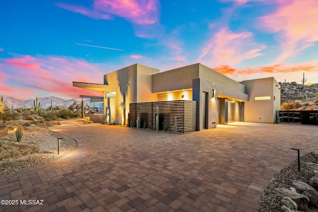 view of front of property with a mountain view