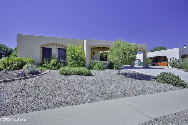 view of front of house with a carport