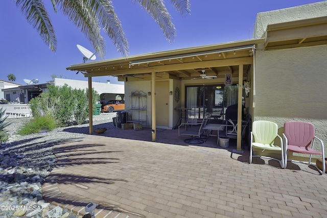 view of patio / terrace with ceiling fan