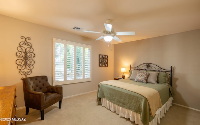 bedroom featuring carpet floors, visible vents, baseboards, and a ceiling fan