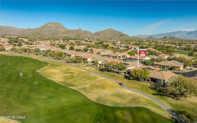 birds eye view of property featuring a residential view, a mountain view, and golf course view