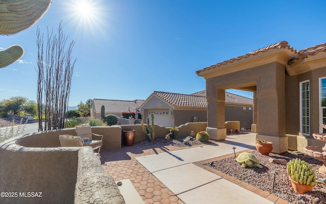 view of patio / terrace featuring fence