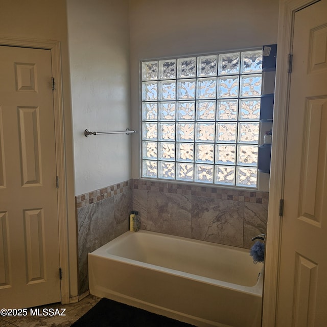 bathroom featuring a bathtub