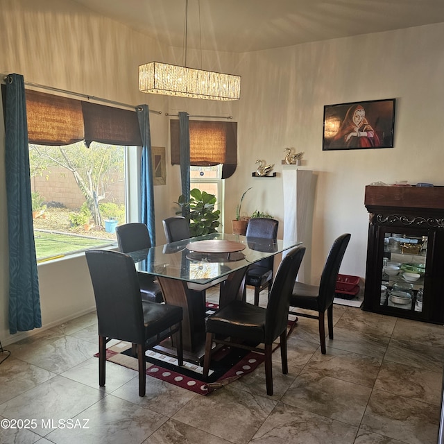 dining room featuring an inviting chandelier