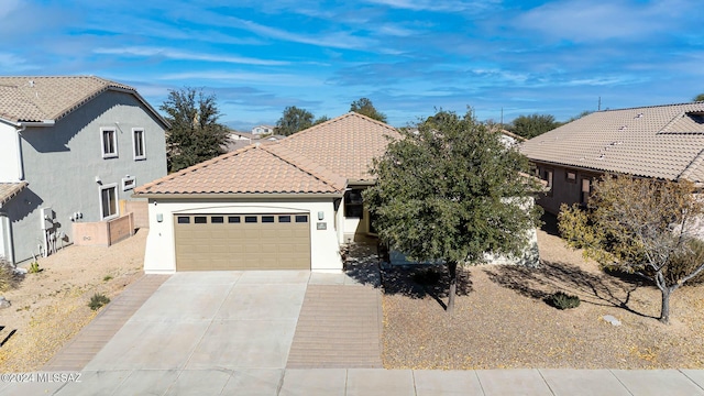 view of front of house with a garage